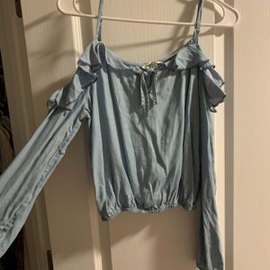 Over-the-shoulder Blue Top